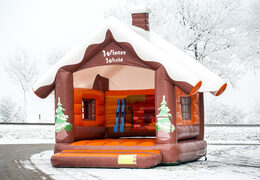 Château gonflable Skihut Winterworld avec une cheminée 3D au sommet pour les enfants. Commandez des châteaux gonflables en ligne chez JB Gonflables France