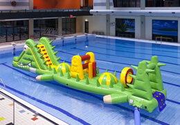 Piscine unique en forme de crocodile de 12 m de long avec des obstacles difficiles pour petits et grands. Achetez des jeux de piscine gonflables maintenant en ligne chez JB Gonflables France