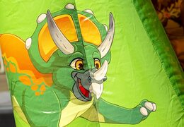 Petit château gonflable vert gonflable avec pilier d'obstacle sur le thème des dinosaures à acheter chez JB Gonflables France en ligne