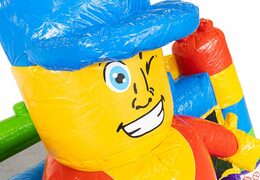 Mini château gonflable sur le thème des superblocs avec toboggan à acheter. Commandez des petit château gonflable avec toboggan en ligne chez JB Gonflables France