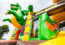 Châteaux gonflables multiplay de taille moyenne sur le thème Dinoworld pour les enfants. Commandez des toboggan châteaux gonflables en ligne chez JB Gonflables France