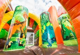 Achetez un châteaux gonflables multiplay sur le thème de Dinoworld avec un toboggan pour les enfants. Commandez des toboggan châteaux gonflables en ligne chez JB Gonflables France