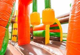 Commandez un châteaux gonflables multiplay de taille moyenne sur le thème dinoworld avec toboggan pour enfants. Achetez des toboggan châteaux gonflables en ligne chez JB Gonflables France