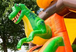 Château gonflable toboggan combo sur le thème des dinosaures à acheter chez JB Gonflables France. Achetez des château gonflable avec toboggan et dinosaure vert pour les enfants
