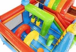 Commandez un coussin d'air gonflable thème tropical avec des toboggans et des objets dans le coussin pour les enfants