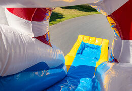 Coussin d'air gonflable avec section de saut et toboggan sur le thème du canard en caoutchouc à vendre pour les enfants