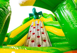 Tour d'escalade dans la maison gonflable Slideworld dino