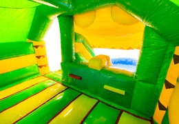 À l'intérieur du château gonflable Double Slide Combo, jaune et vert