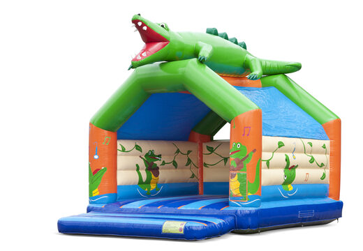 Achetez un grand château gonflable d'intérieur sur le thème du crocodile pour les enfants. Disponible chez JB Gonflables France en ligne