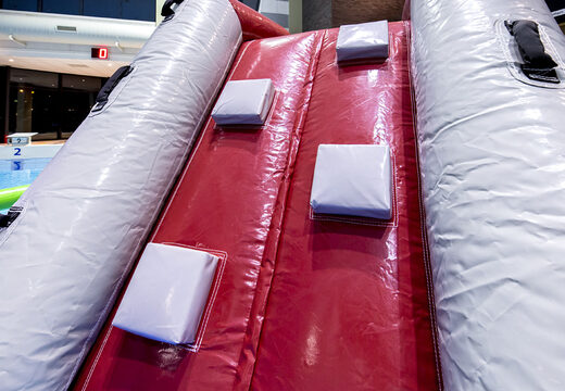 Île de jeu cool sur le thème des requins avec une vigne, une tour d'escalade, un toboggan rond et des obstacles pour petits et grands. Commandez des jeux de piscine gonflables maintenant en ligne chez JB Gonflables France