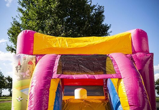 Petit château gonflable multifun jaune et rose sur le thème des contes de fées princesse à acheter. Commandez en ligne chez JB Gonflables France