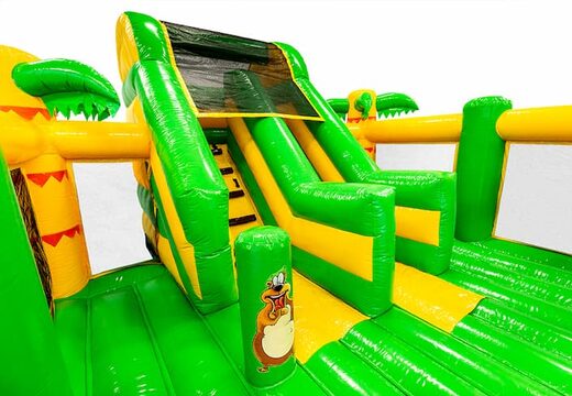 Achetez une château gonflable géant à glissière couverte Maison de rebond Jungle avec toboggan pour les enfants. Commandez des super châteaux gonflables en ligne chez JB Gonflables France