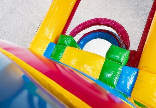 Mini château gonflable multijoueur sur le thème des flamants roses avec toboggan pour enfants. Commandez des mini multiplay en ligne chez JB Gonflables France