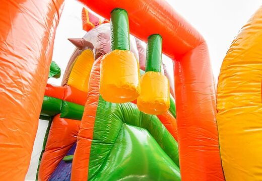 Châteaux gonflables multiplay dinoworld avec un toboggan, des objets amusants sur la surface de saut et des objets 3D accrocheurs pour les enfants. Commandez des toboggan châteaux gonflables en ligne chez JB Gonflables France