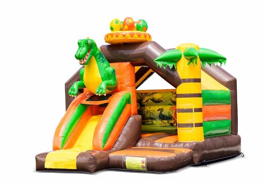 Château gonflable toboggan combo sur le thème des dinosaures à vendre chez JB Gonflables France. Commandez des château gonflables avec toboggan pour enfants