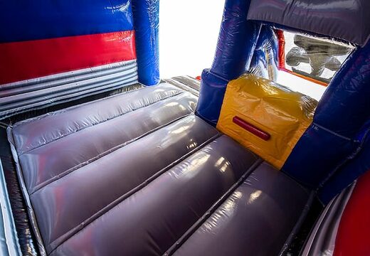 Achetez un château gonflable toboggan combo formule 1 videur pour enfants. Château gonflable avec toboggan  à vendre chez JB Gonflables France