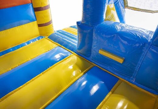 commandez un transat gonflable sur le thème des caraïbes avec toboggan avec planche de surf pour enfants