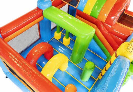 Commandez un coussin d'air gonflable thème tropical avec des toboggans et des objets dans le coussin pour les enfants