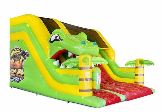 Commandez un toboggan gonflable sur le thème des dinos rouge et vert pour les enfants
