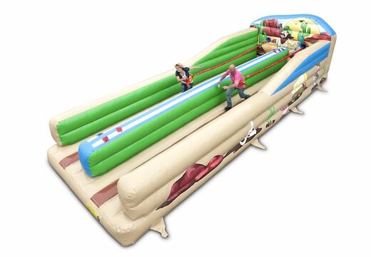 Opblaasbare Bungeerun kopen voor kids in thema western. Attractie voor zeskamp sport en spel dorpsfeest bij JB Inflatables