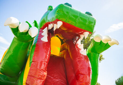 Coussin d'air gonflable multiplay avec toboggan thème dino vert jaune à vendre