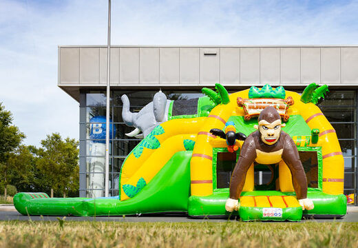 Commandez multi transat super gonflable avec toboggan thème Jungle vert jaune pour enfant