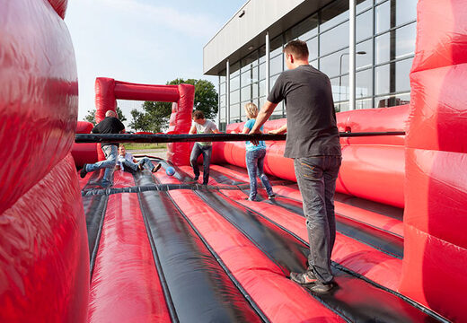 Baby-foot gonflable rouge noir avec système coulissant d'embarquement unique à vendre