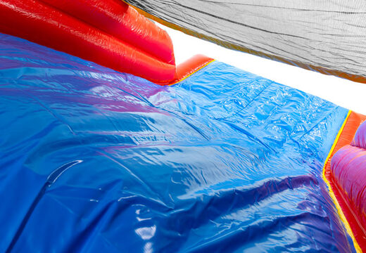 Parcours d'obstacles gonflable avec des graphismes Comic audacieux